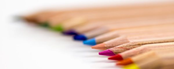 selective focus photography of color pencil lot